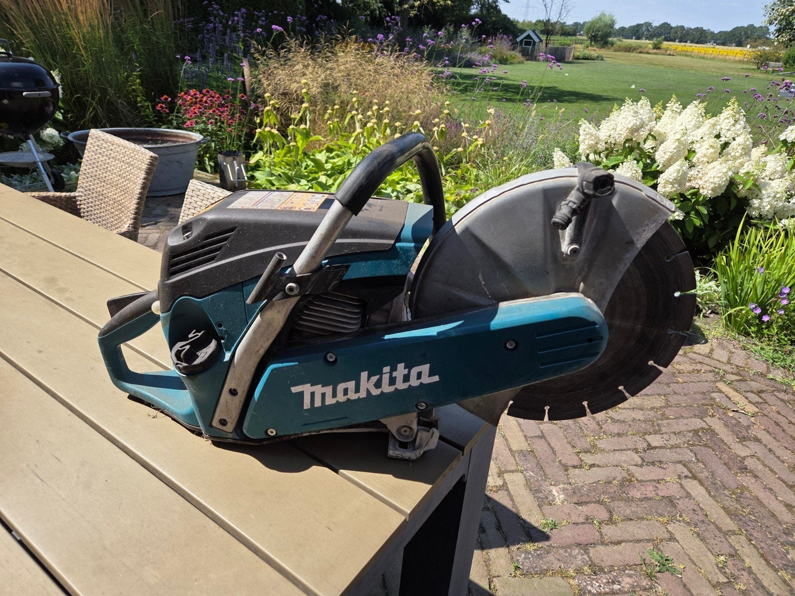 Makita motordoorslijper/bandenzaag inclusief blad, Ophalen, Gebruikt