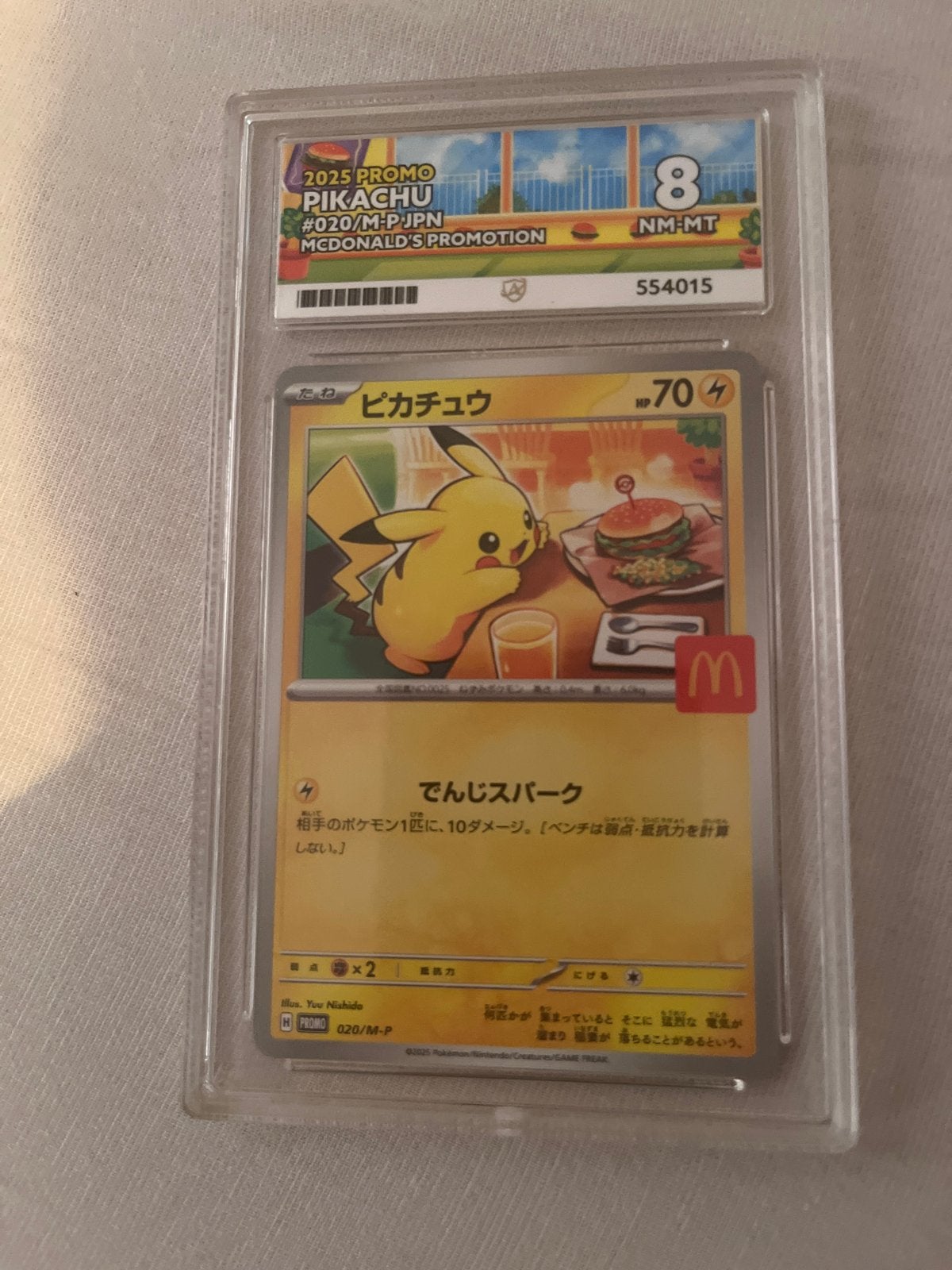 Pikachu McDonald's Promo 2025 #020/M-P JPN PSA 8, Ophalen of Verzenden, Zo goed als nieuw, Losse kaart