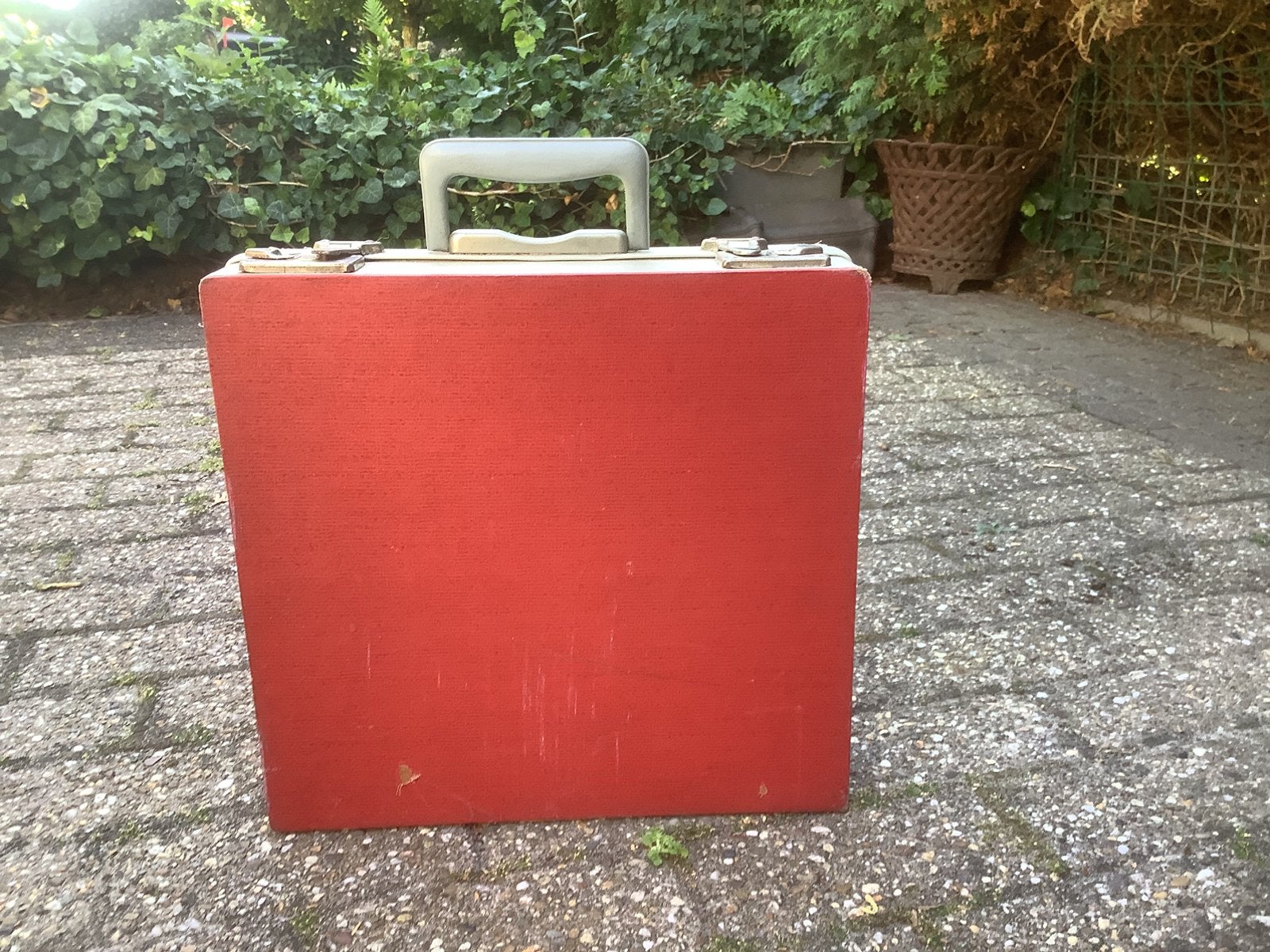 Platen koffer met inhoud., Ophalen