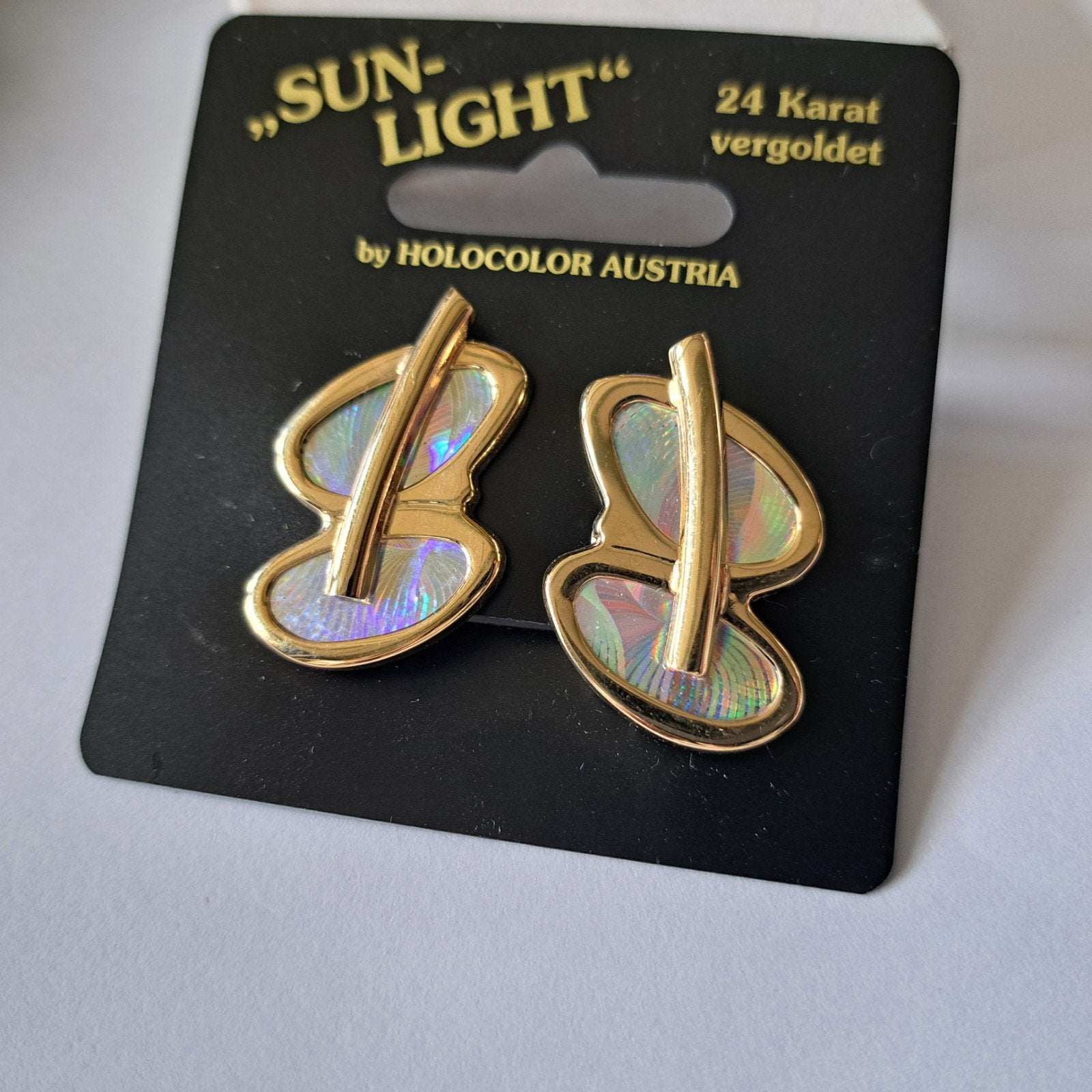 Vintage sunlight design oorbellen clips verguld hologram, Verzenden, Goud, Overige materialen