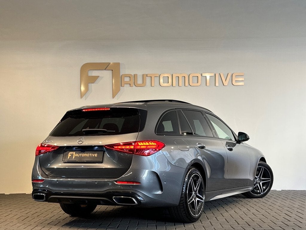 Mercedes-Benz C-klasse Estate 300 e AMG Pano|Keyless|Sfeer, Auto's, Mercedes-Benz, Automaat, Achterwielaandrijving, 4 cilinders