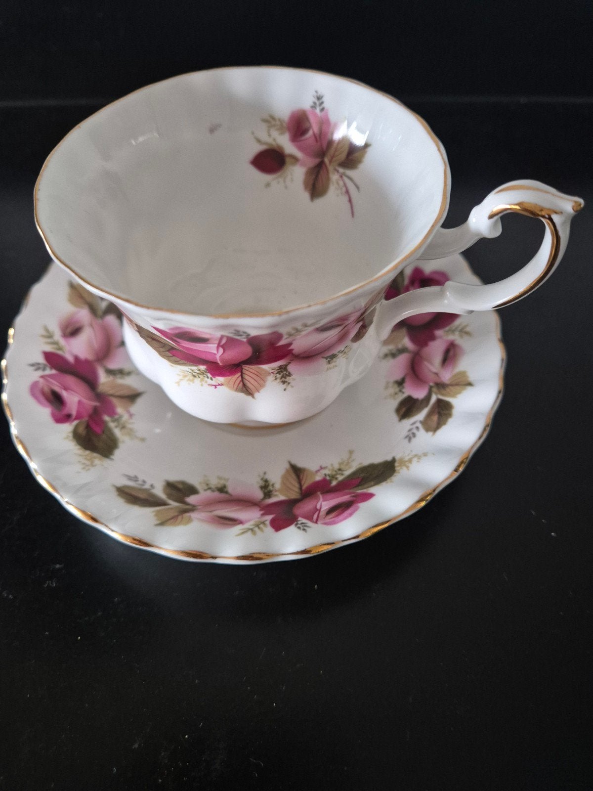 Fine bone china porselein, Ophalen of Verzenden, Gebruikt, Porselein, Kop en/of schotel