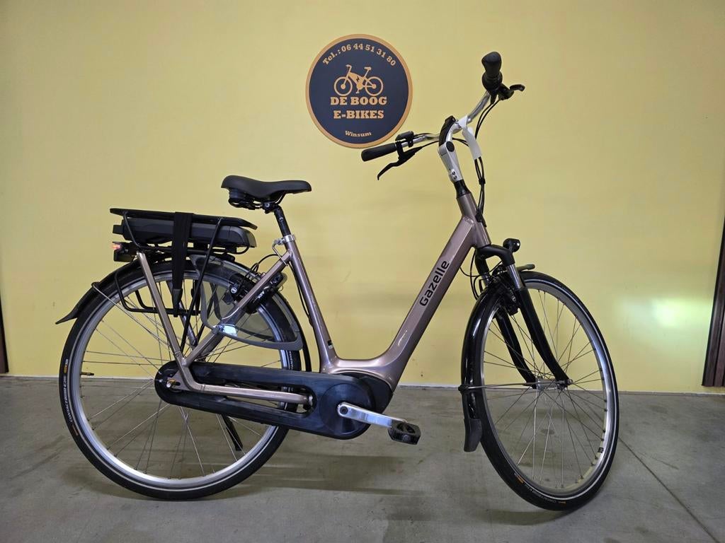 Gazelle orange c 7 met bosch en nieuwe accu, Ophalen, Info@deboogebikes.nl, 53 tot 56 cm, Versnellingen