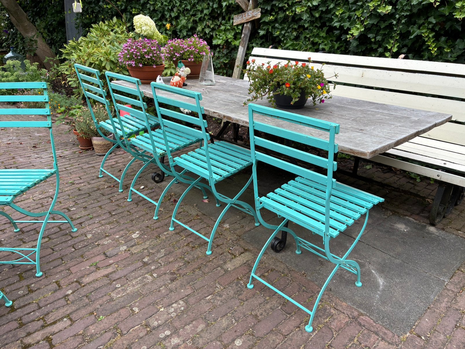 6 inklapbare turquoise tuinstoelen met ijzeren tafel, Ophalen of Verzenden, Gebruikt, Metaal, Inklapbaar