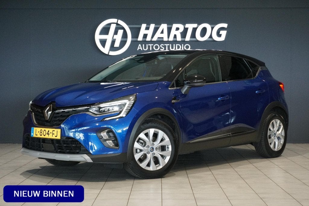 Renault Captur 1.6 E-Tech Plug-in Hybrid 160 Intens *DEALER, Auto's, Stof, Gebruikt, 4 cilinders, Blauw