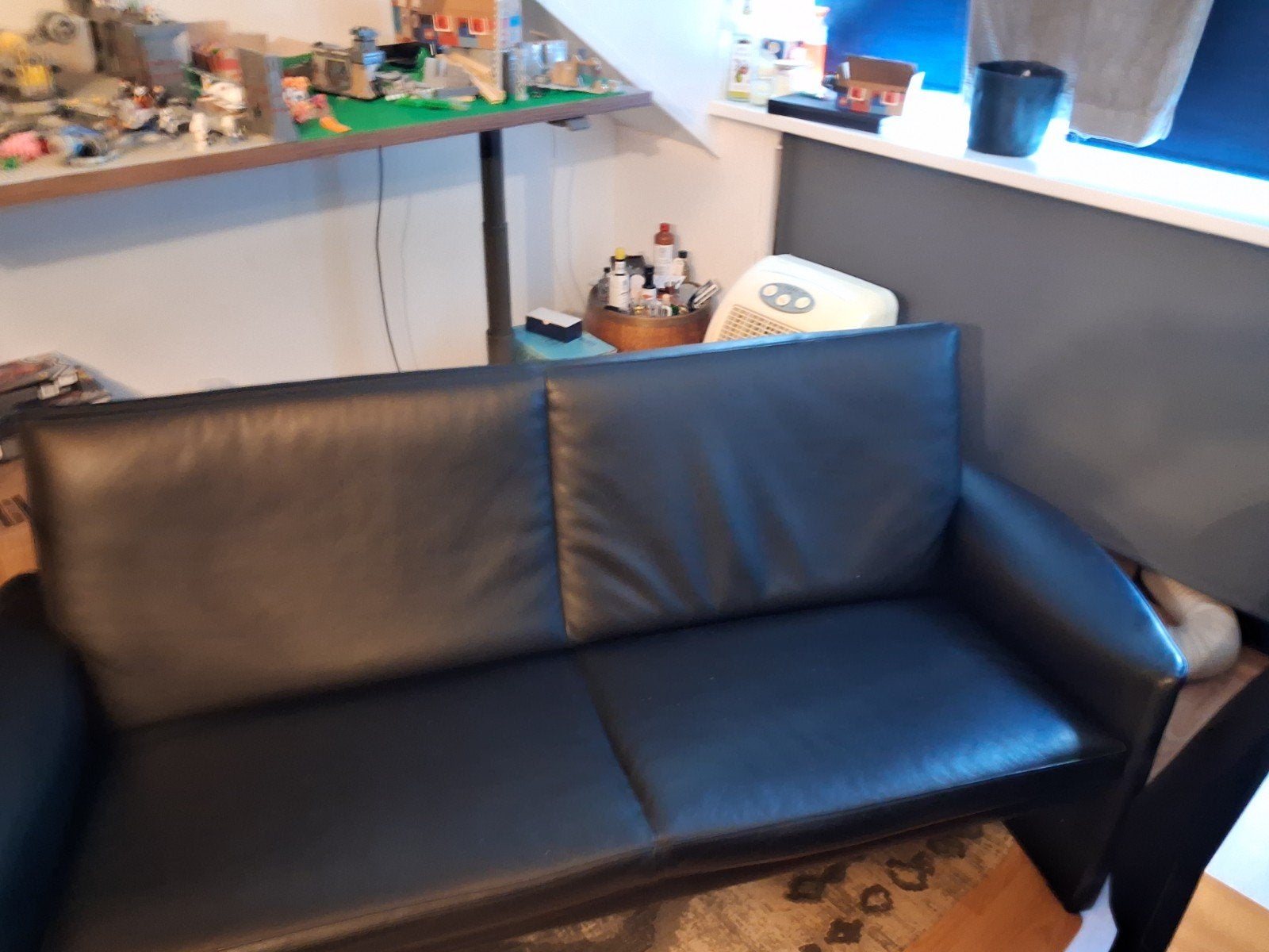 Zwarte leren sofa bank 1.83 cm 85 cm h en 83 Leolux Antipode, Gebruikt, Tweepersoons, Ophalen of Verzenden, Modern
