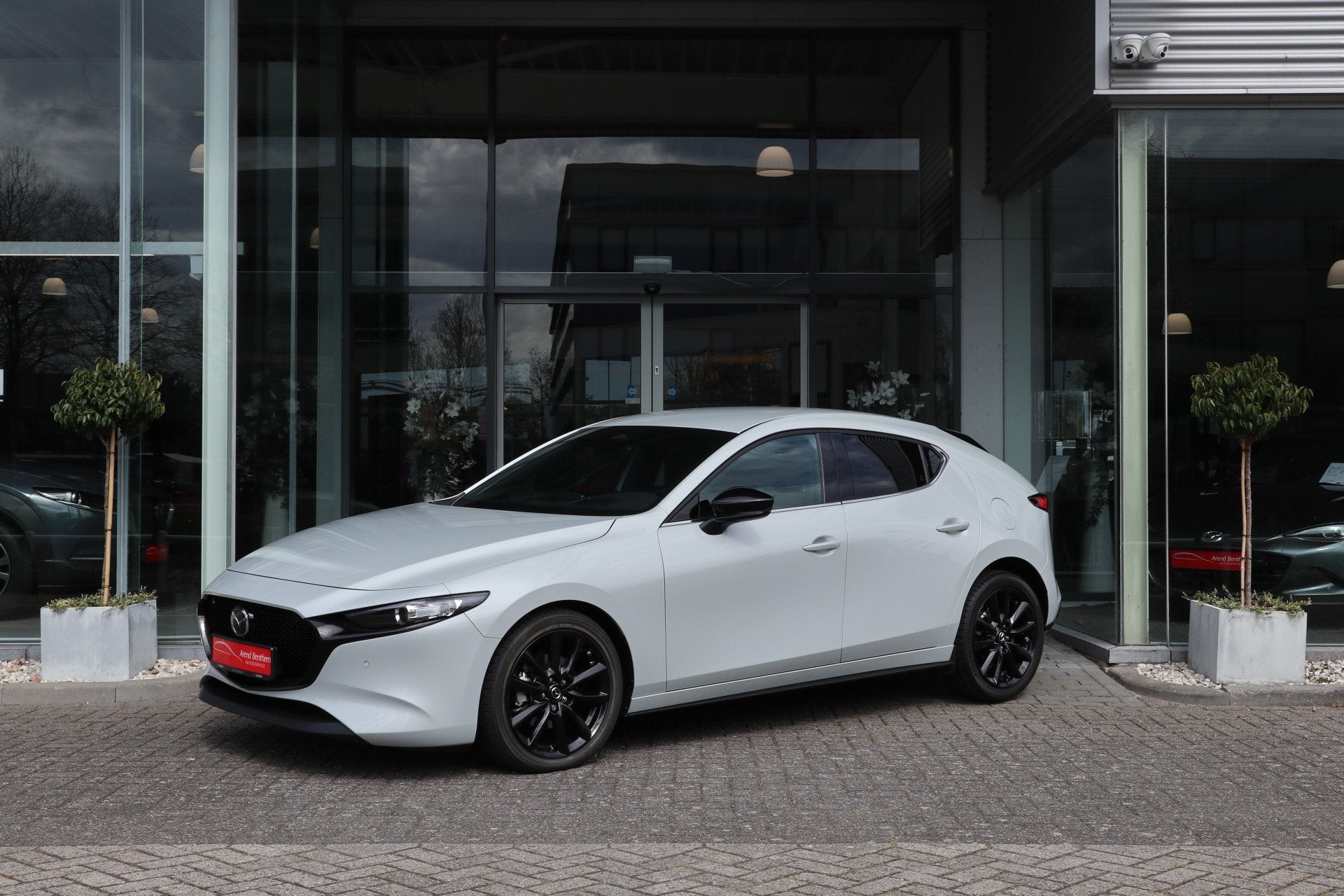 Mazda 3 2.0 e-SkyActiv-X M Hybrid 186 Homura Camera / Head-u, Auto's, Mazda, Stof, Gebruikt, 4 cilinders, Origineel Nederlands