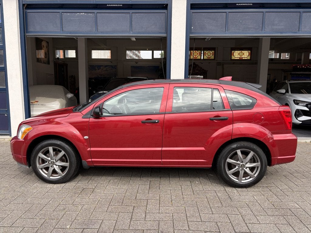 Dodge Caliber 2.0 SE AUTOMAAT/LEDER/AIRCO/NW APK (bj 2007), Auto's, Dodge, 1998 cc, 450 kg, Gebruikt, 1335 kg