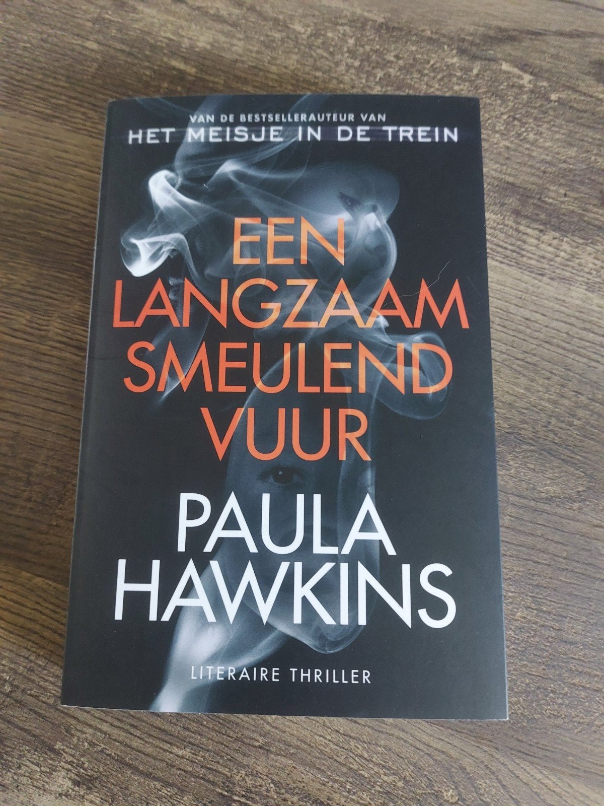 Een langzaam smeulend vuur Paula Hawkins, Ophalen of Verzenden