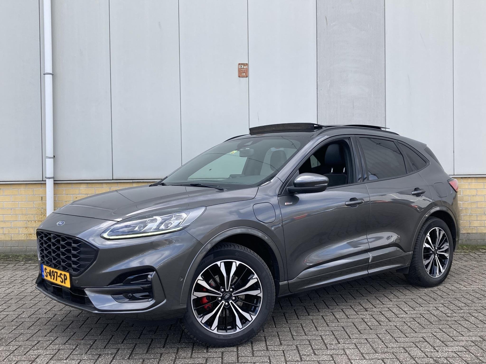 Ford Kuga 2.5 PHEV 225 ST-Line X Panoramadak- Driver Asstanc, 14 kWh, Gebruikt, 4 cilinders, Leder en Stof