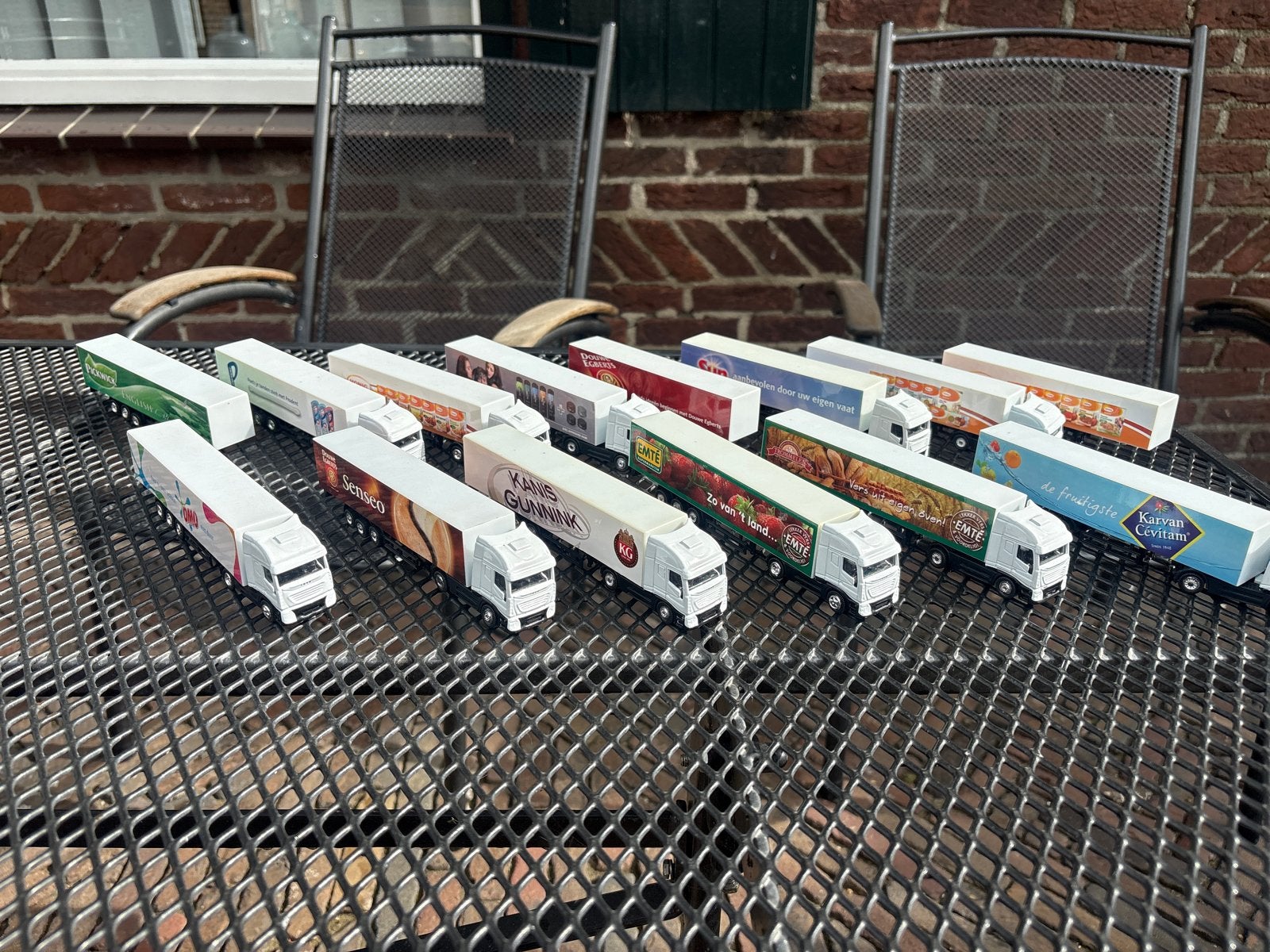 Verzameling miniatuur vrachtwagens met reclame, Ophalen, Zo goed als nieuw, Bus of Vrachtwagen