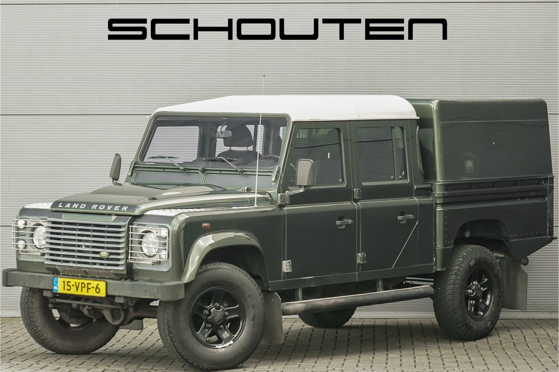 Land Rover Defender 2.4 TD 130" S Crew Cab Xenon LED, Stof, Gebruikt, Zwart, 4 cilinders