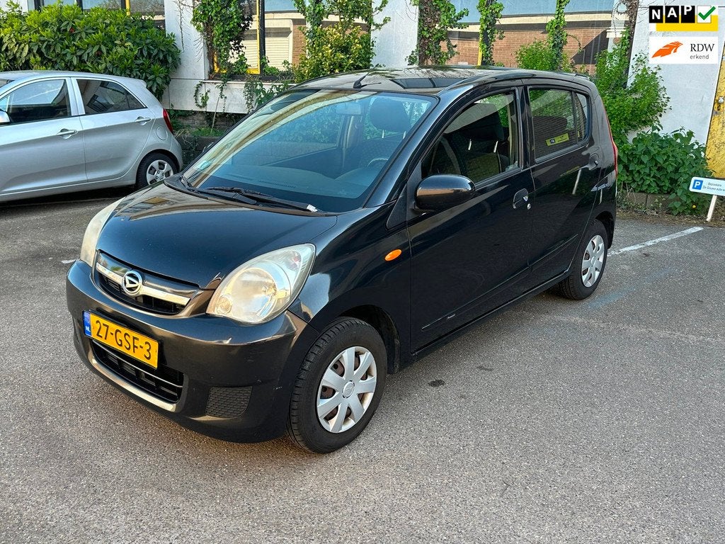 Daihatsu Cuore 1.0 Premium / 5 Deurs/ Airco/ Elek. Ramen, Auto's, Daihatsu, Voorwielaandrijving, 18 €/maand, 4 stoelen, Cuore