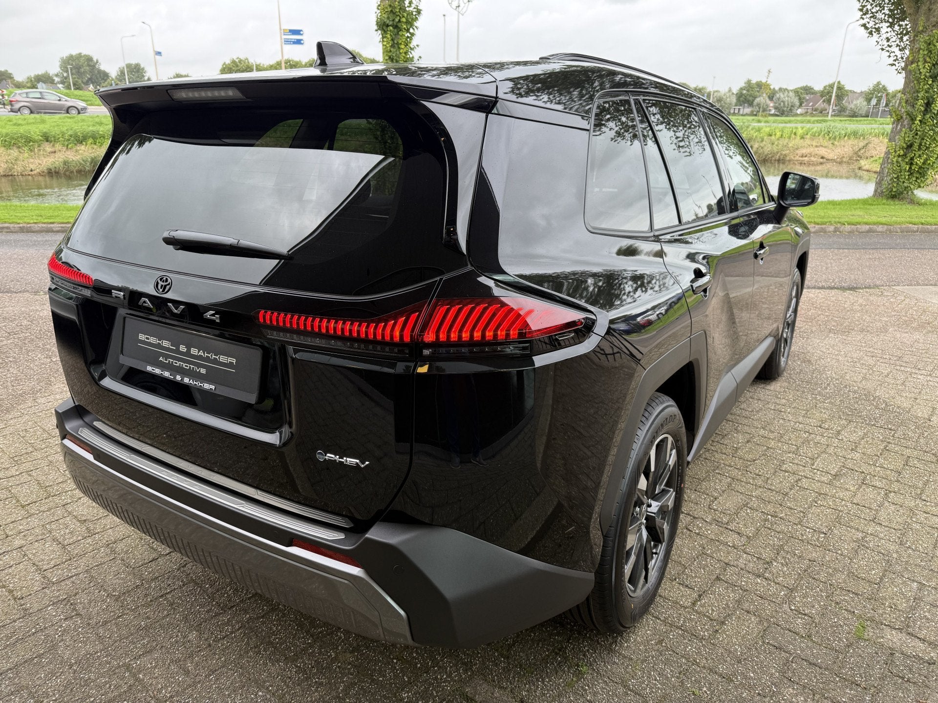 Toyota RAV4 2.5 Plug-in Hybrid 270 Dynamic * Navigatie * Car, Auto's, Dealer onderhouden, Stof, Gebruikt, Zwart