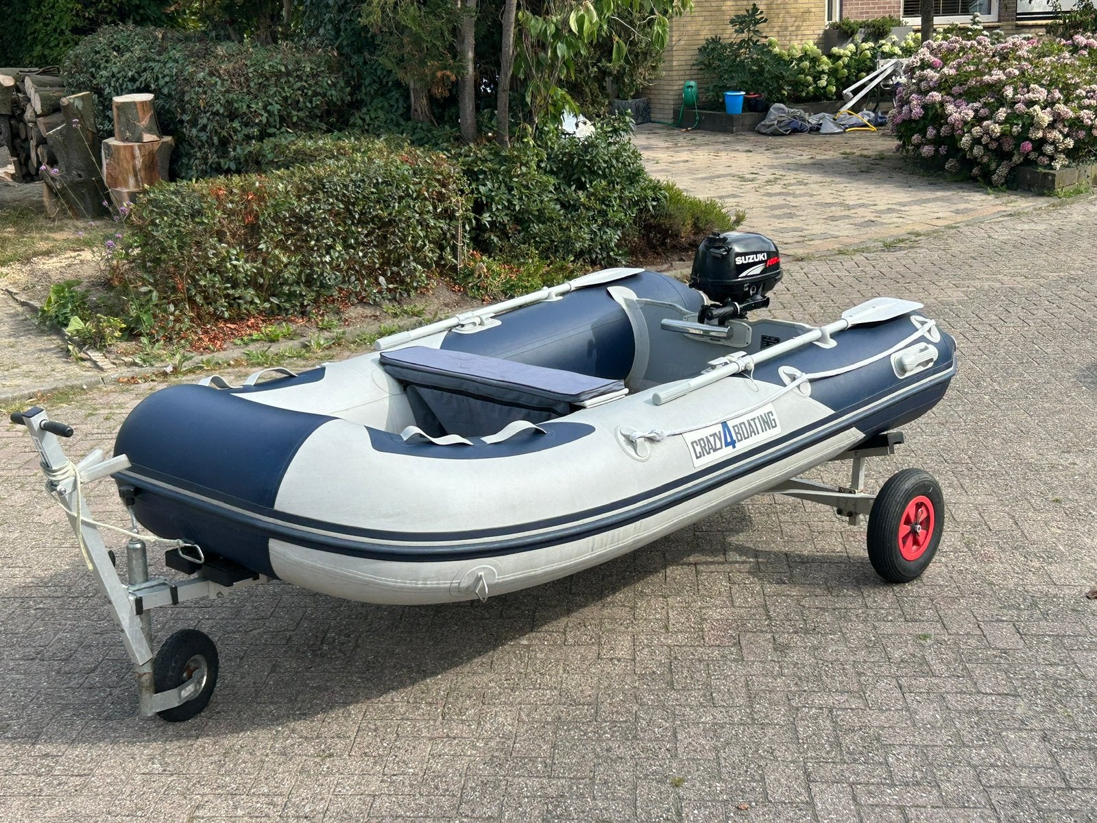 rubberboot + Suzuki 4tact motor, Ophalen, Zo goed als nieuw, SUP-boards