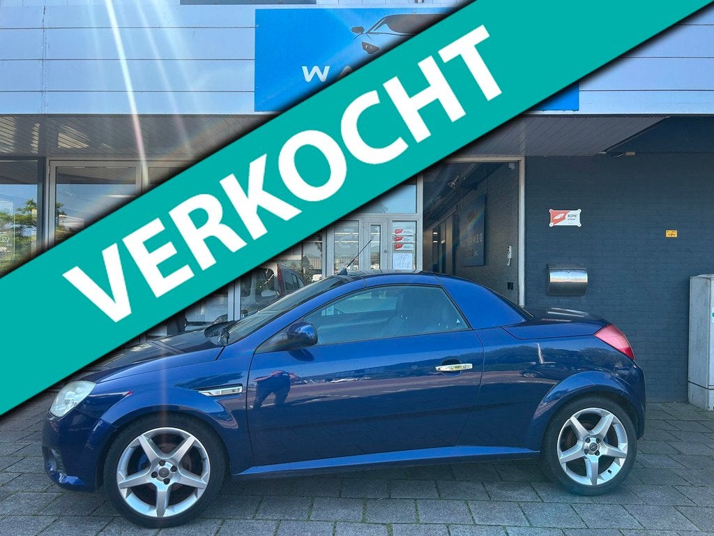Opel Tigra TwinTop 1.4-16V Cosmo Airco/Leer/PDC/Lm velgen, Auto's, Opel, Bedrijf, Te koop, Tigra, ABS, Airbags, Airconditioning