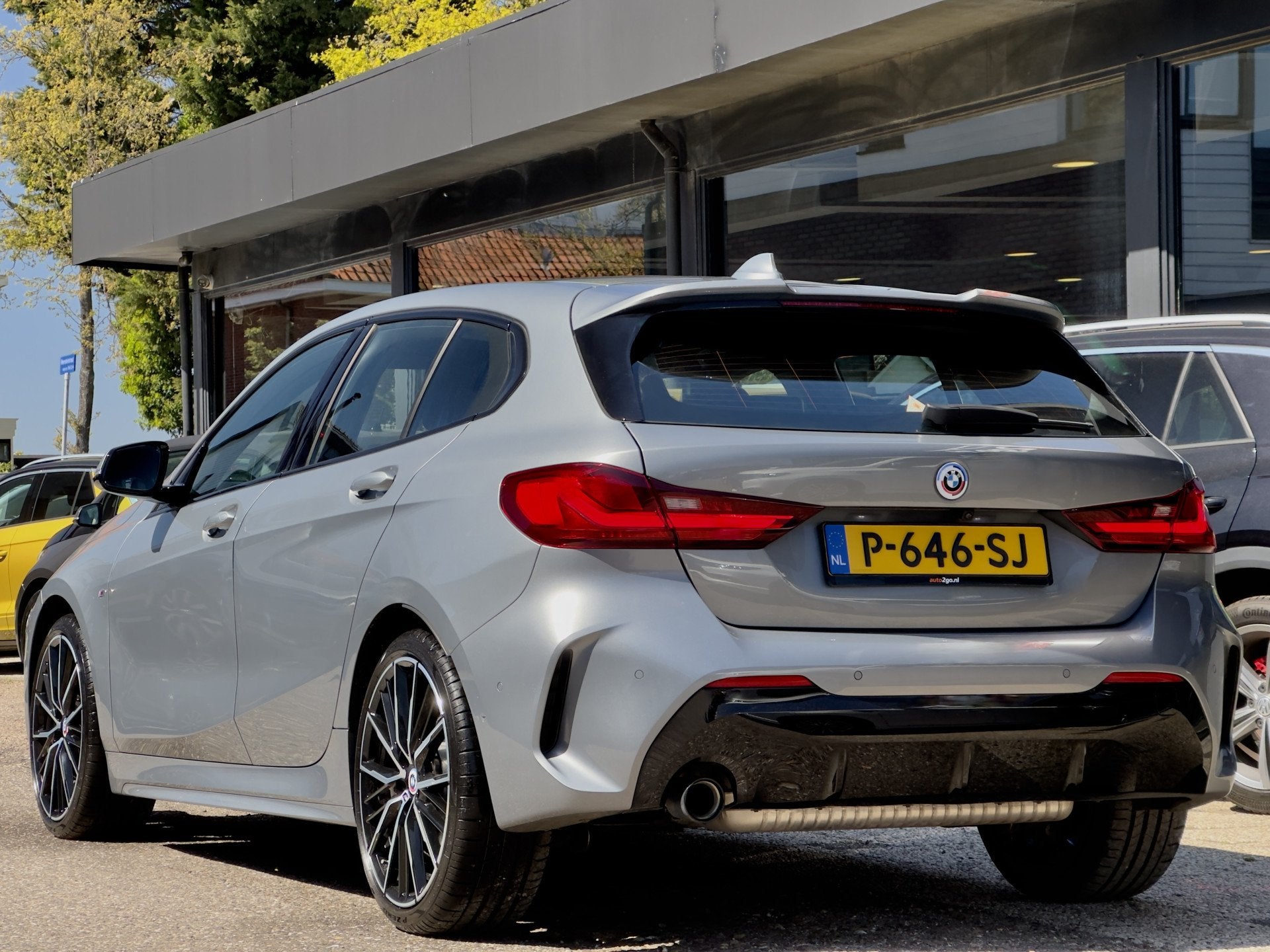 BMW 1-serie 118i AUT7 M-SPORT EXECUTIVE LEDER NAVI CAMERA DI, Dealer onderhouden, 136 pk, Gebruikt, Leder en Stof