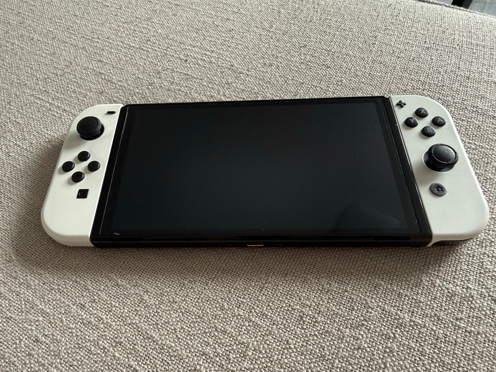 Nintendo Switch OLED zgan, Spelcomputers en Games, Ophalen, Zo goed als nieuw, Met 2 controllers, Switch OLED