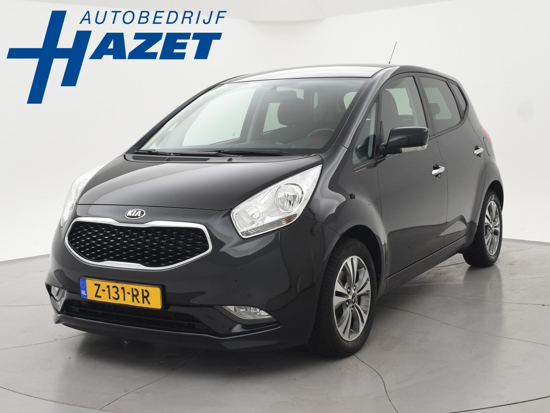 Kia Venga 1.6 CVVT AUTOMAAT + STUUR/STOELVERWARMING | PARKEE, Auto's, Gebruikt, 4 cilinders, Parkeersensor, Zwart