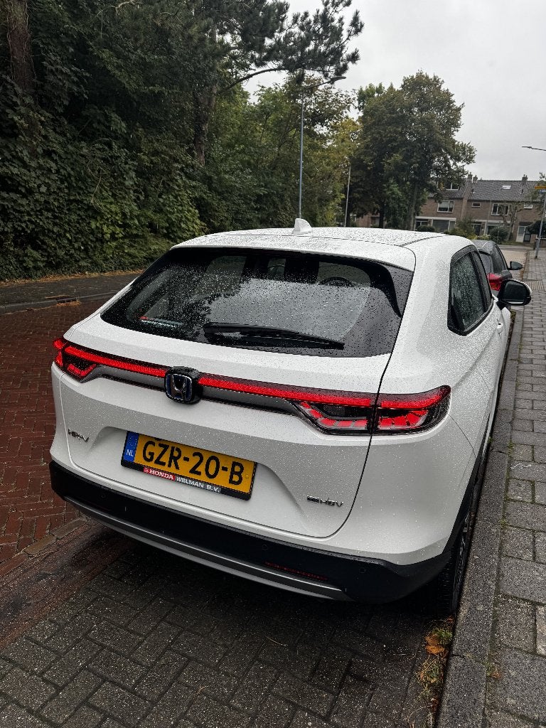 Honda HR-V 1.5 e:HEV Elegance 2025 Garantie 2032 | dealer o., Auto's, Dealer onderhouden, 1498 cc, Leder en Stof, Wit