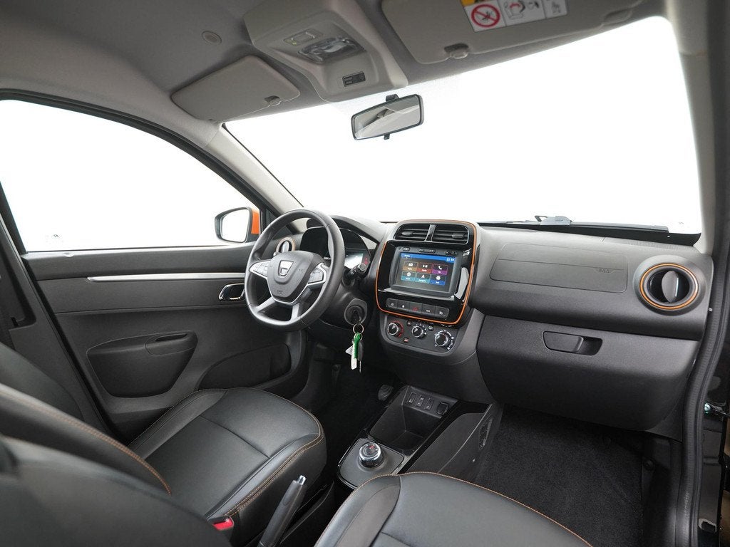 Dacia Spring Comfort Plus 27 kWh | Camera | Carplay | Zondag, Auto's, Dacia, 12 maanden, Gebruikt, Zwart, Parkeersensor