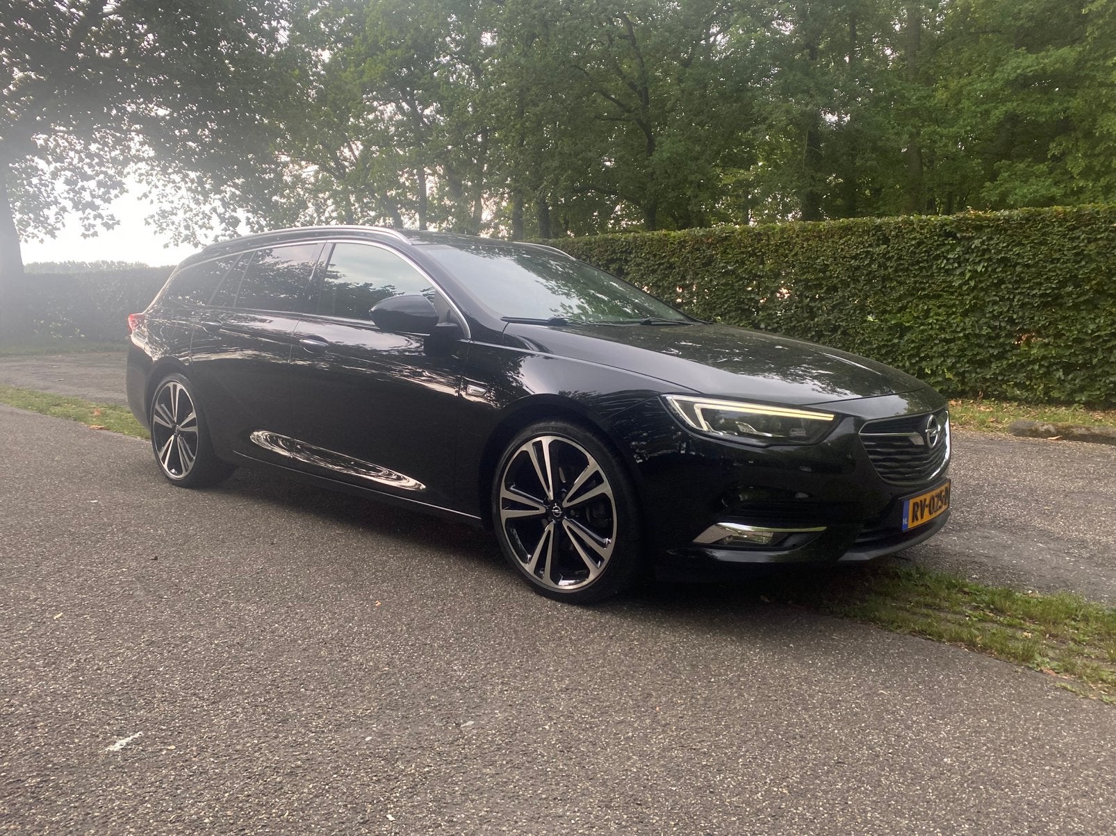 Opel Insignia Sports Tourer 1.5 Turbo Innovation, Auto's, Opel, 4 cilinders, Leder en Stof, Zwart, 1490 cc