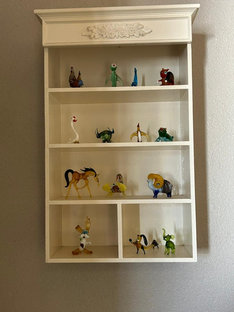 Geblazen glas dierfuguren, Ophalen