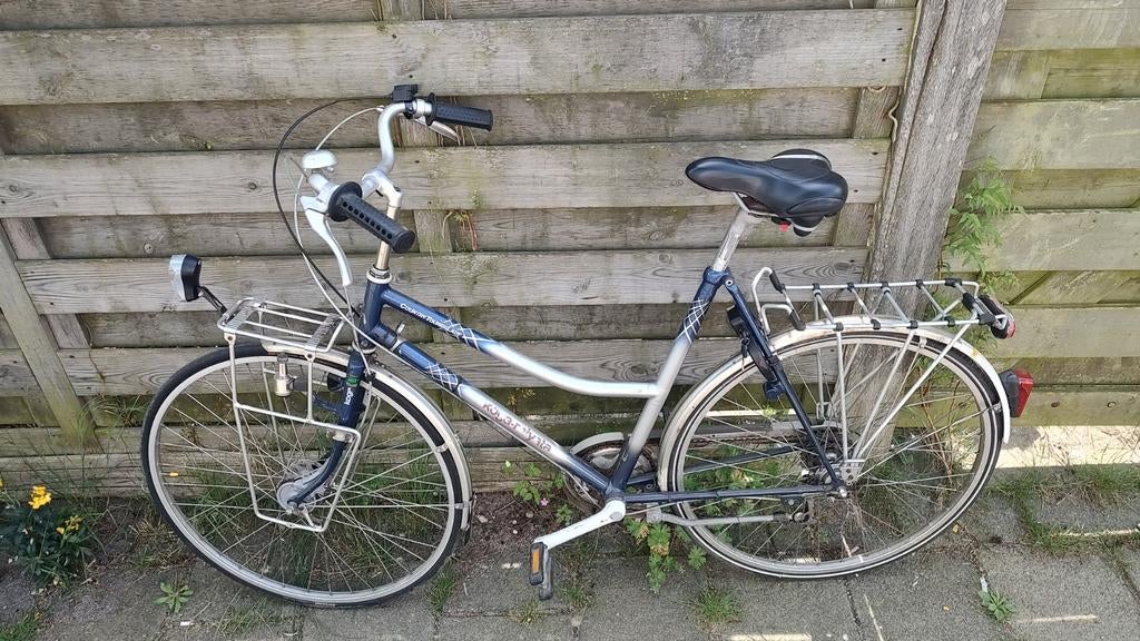 Koga damesfiets met 7 versnellingen, licht en slot. Bike, Gebruikt, Velgrem, Versnellingen, 56 cm of meer