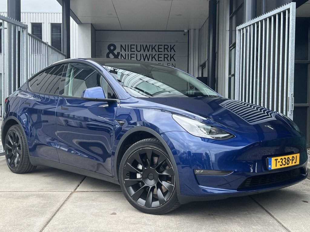 Tesla Model Y Long Range AWD 75 kWh (bj 2023, automaat), Auto's, Tesla, Gebruikt, Huisgarantie, Met garantie (alle), Blauw