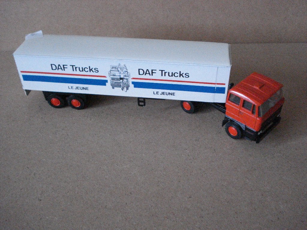 1:50 Lion Car DAF 2800 ti met oplegger Le Jeune, Ophalen of Verzenden, Gebruikt, Bus of Vrachtwagen, Lion Toys