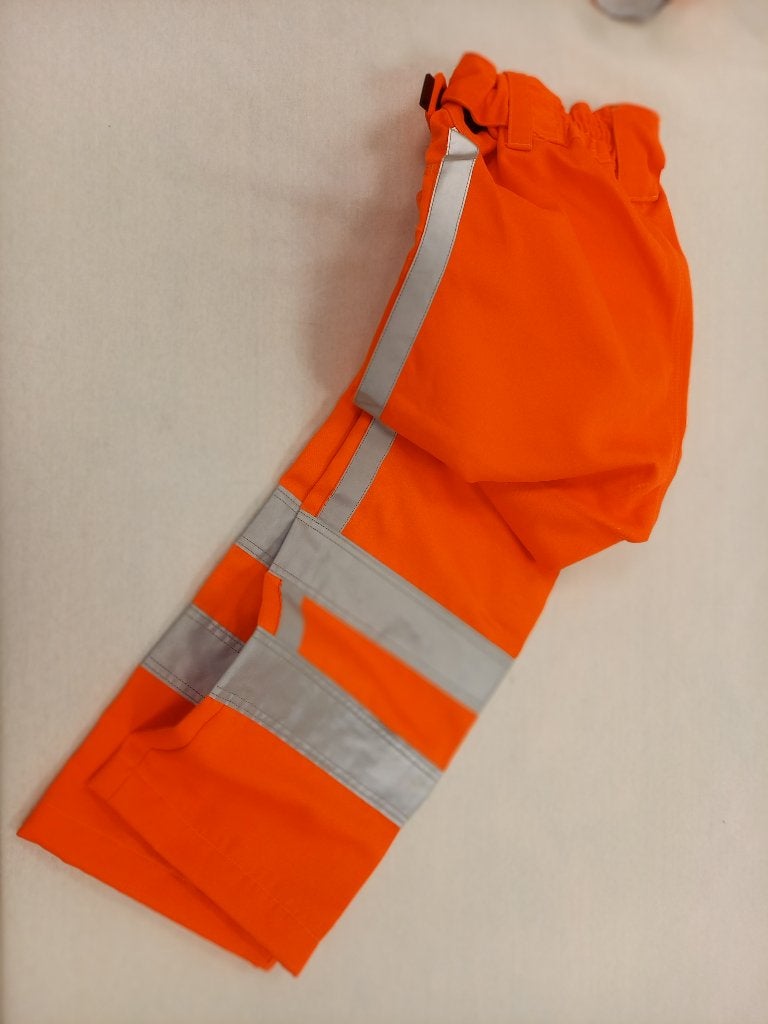 Oranje werkbroek en veiligheidsvest met reflectoren, Ophalen of Verzenden, Zo goed als nieuw