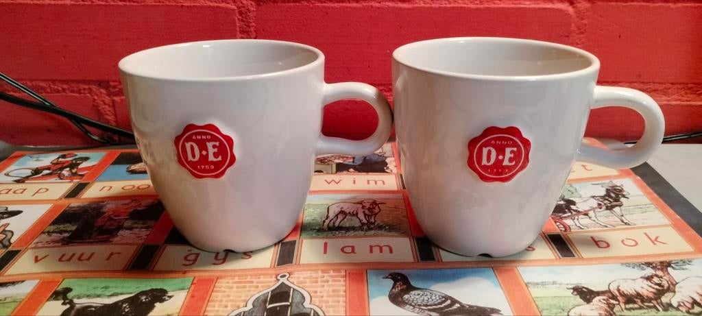 Douwe Egberts koffie mokken Paul de Leeuw My Fair Lady., Huis en Inrichting, Ophalen of Verzenden, Overige stijlen, Kop(pen) en/of Schotel(s)