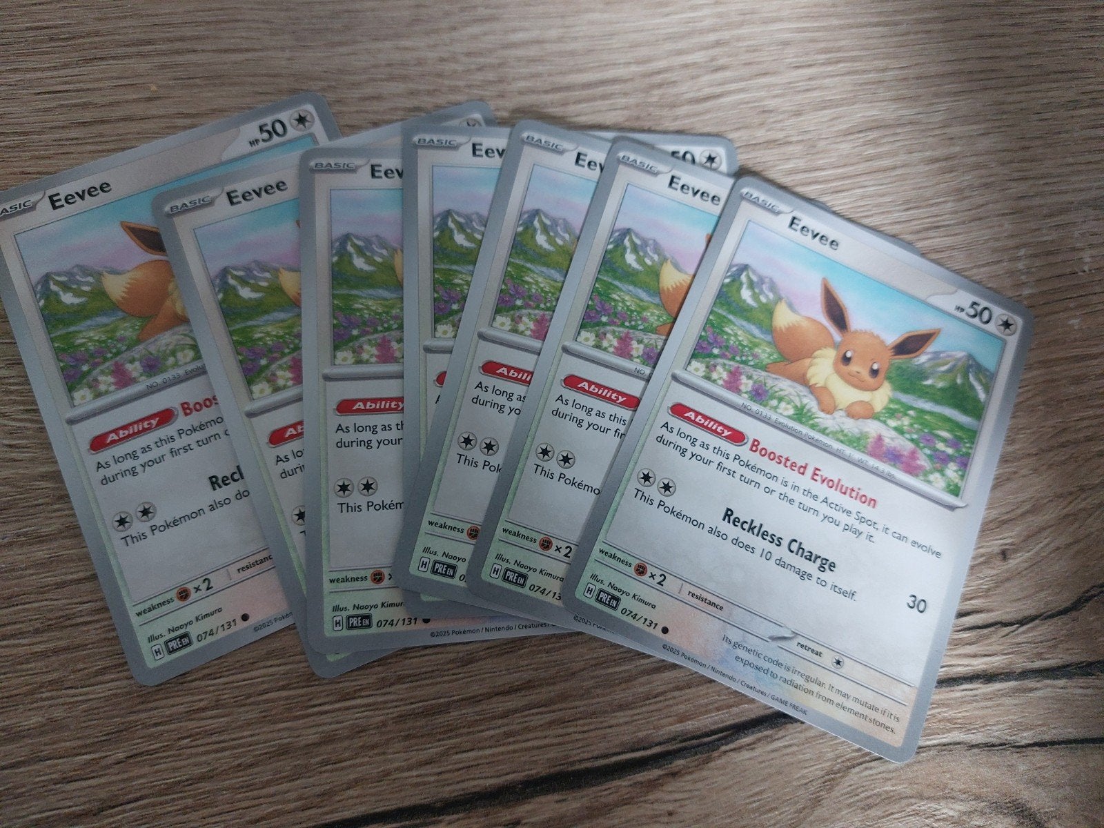 Lot van 7 Eevee Pokémon kaarten uit de PRE set, Ophalen of Verzenden, Zo goed als nieuw, Meerdere kaarten
