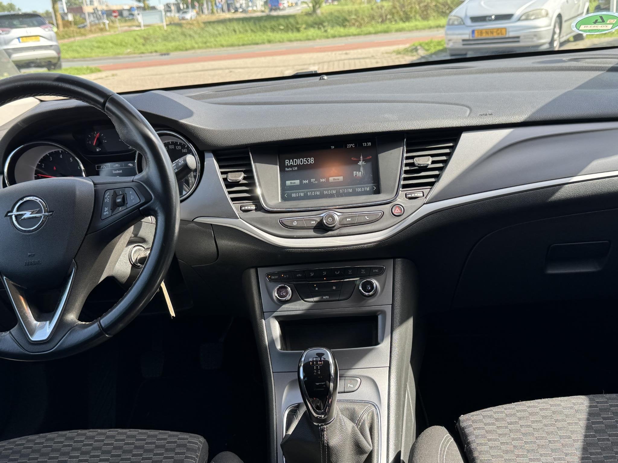 Opel Astra 1.0 Turbo 120 Jaar Edition Rijklaar inclusief gar, Auto's, Opel, 12 maanden, Stof, Gebruikt, Blauw