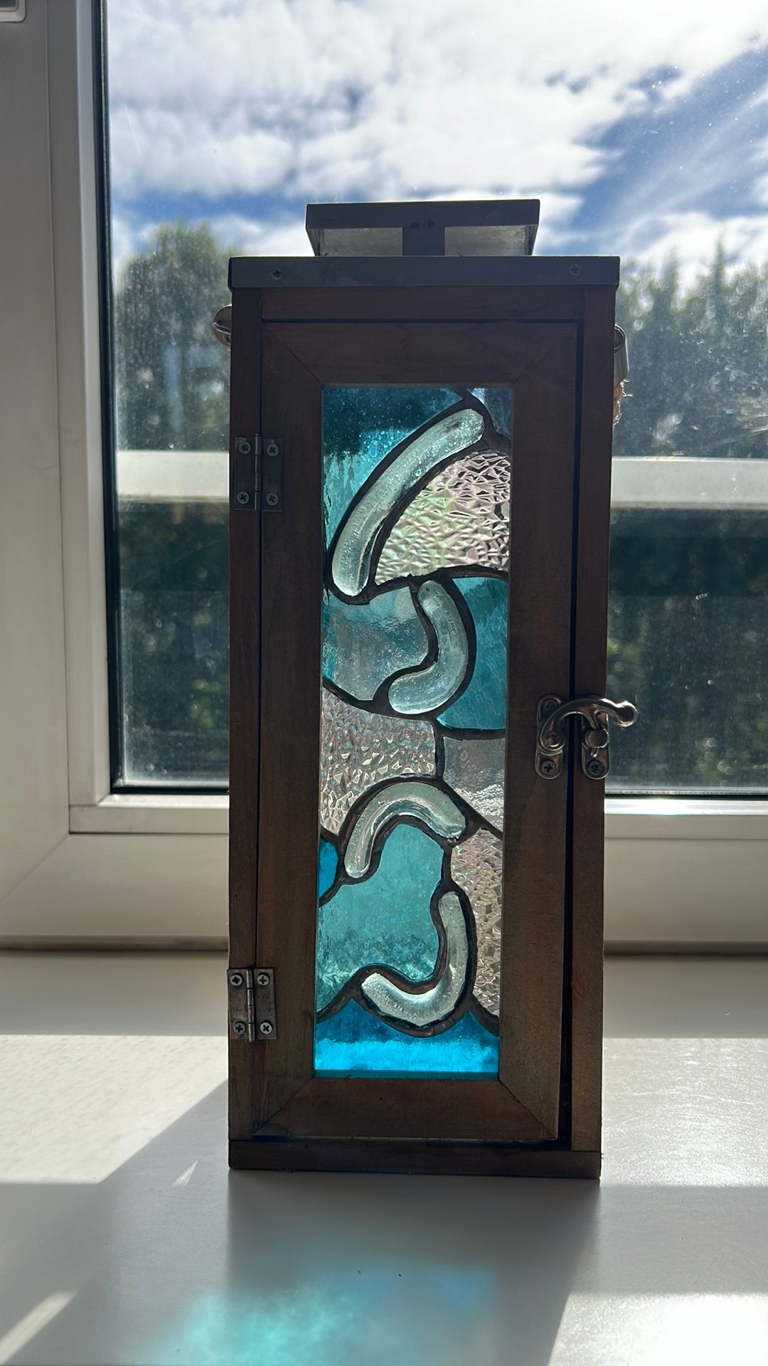 Mooi glas in lood, Ophalen