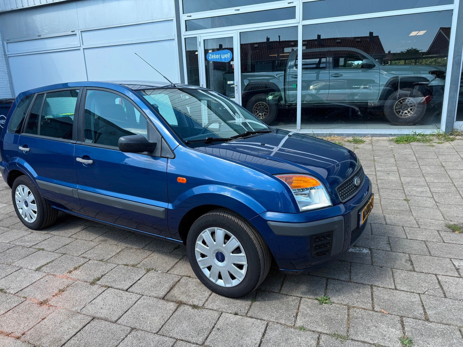 Ford Fusion Ford Fusion 1.4-16V Cool & Sound (2010) – Slec, Auto's, Voorwielaandrijving, 15 km/l, Gebruikt, Blauw