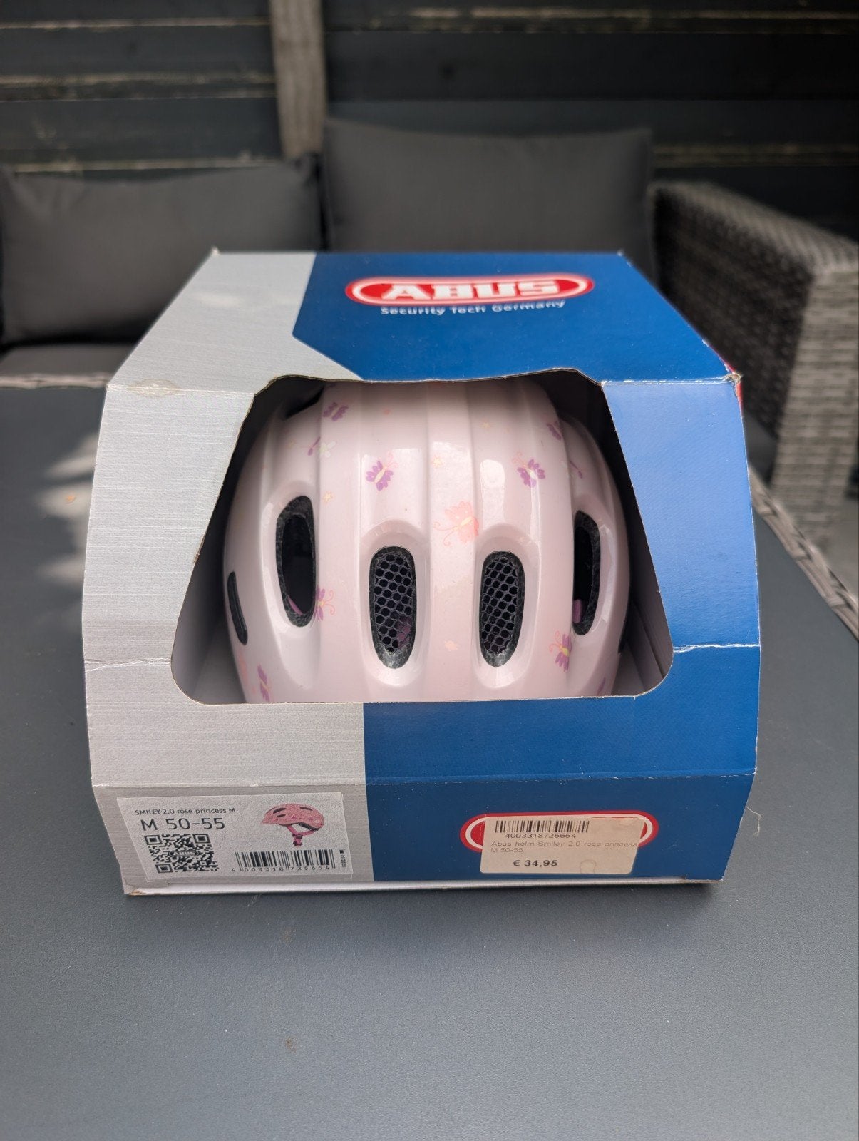 Abus fietshelm meisje Roze met vlinders, Ophalen