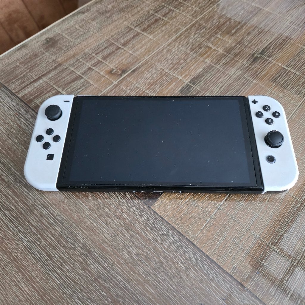 Foto 3 van Nintendo Switch OLED (wit) met veel accessoires