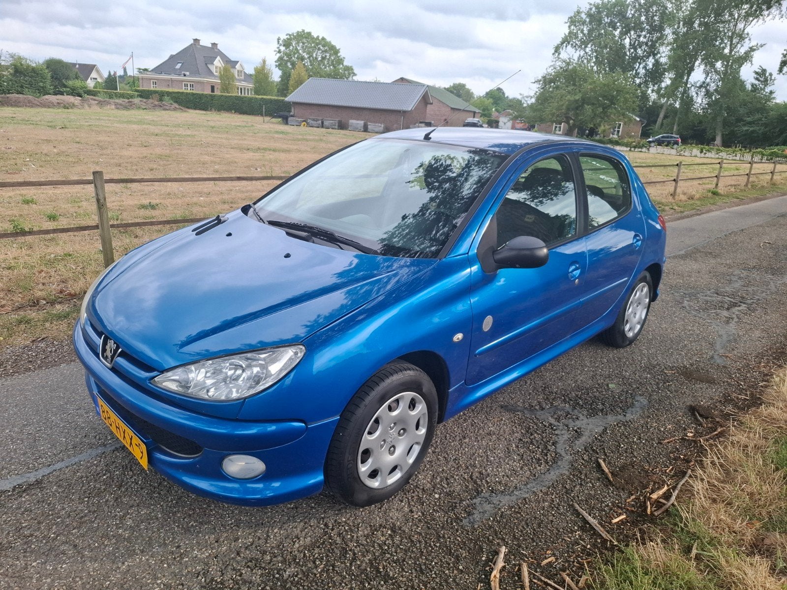 Peugeot 206 1.4 5D 2009 Blauw, Voorwielaandrijving, 31 €/maand, 4 cilinders, Blauw