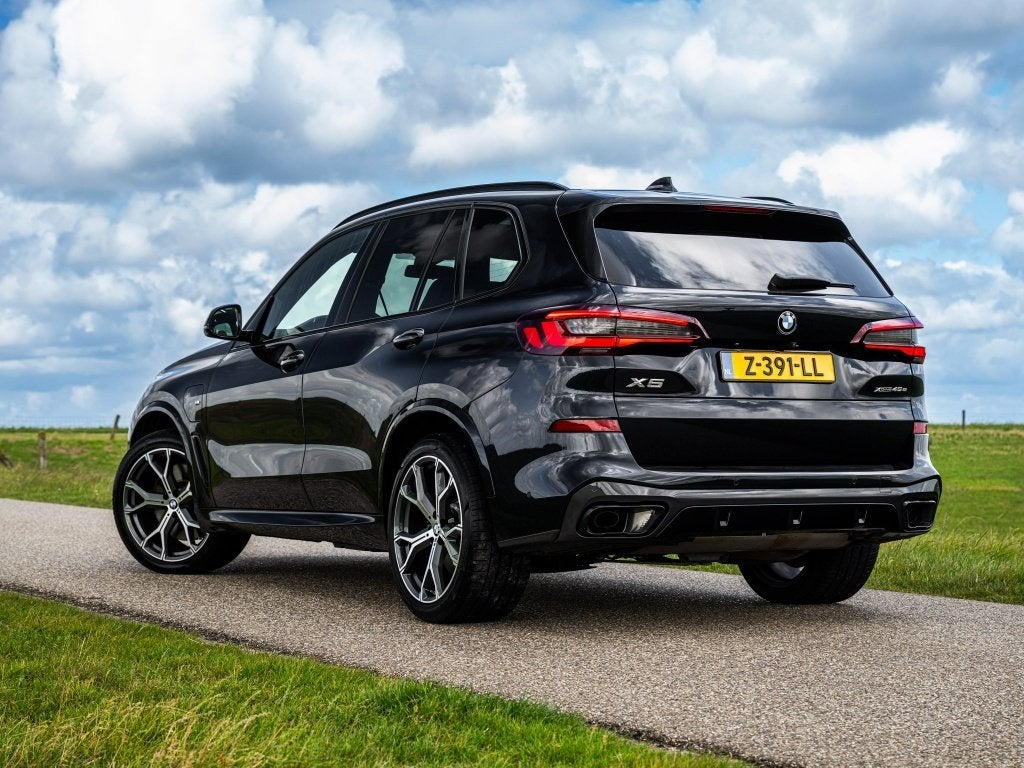 BMW X5 xDrive45e High Ex. M-Sport Pano Trekhaak (bj 2021), Auto's, BMW, Gebruikt, Automatische klimaatregeling, Zwart, Hybride Elektrisch/Benzine