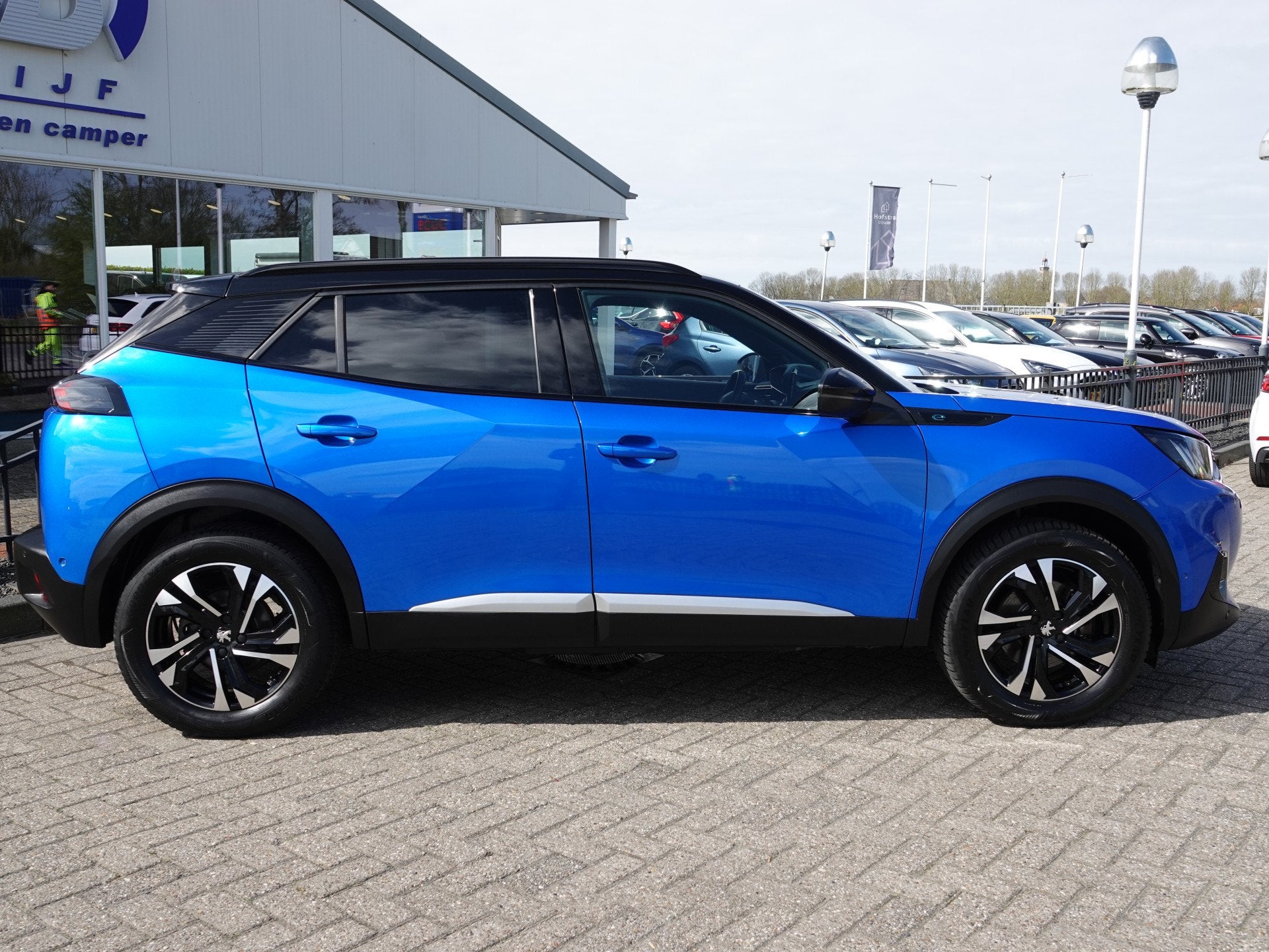 Peugeot e-2008 EV GT 50 kWh H-LEER | NAVI | CAMERA | ECC | C, 136 pk, Gebruikt, Blauw, Leder en Stof