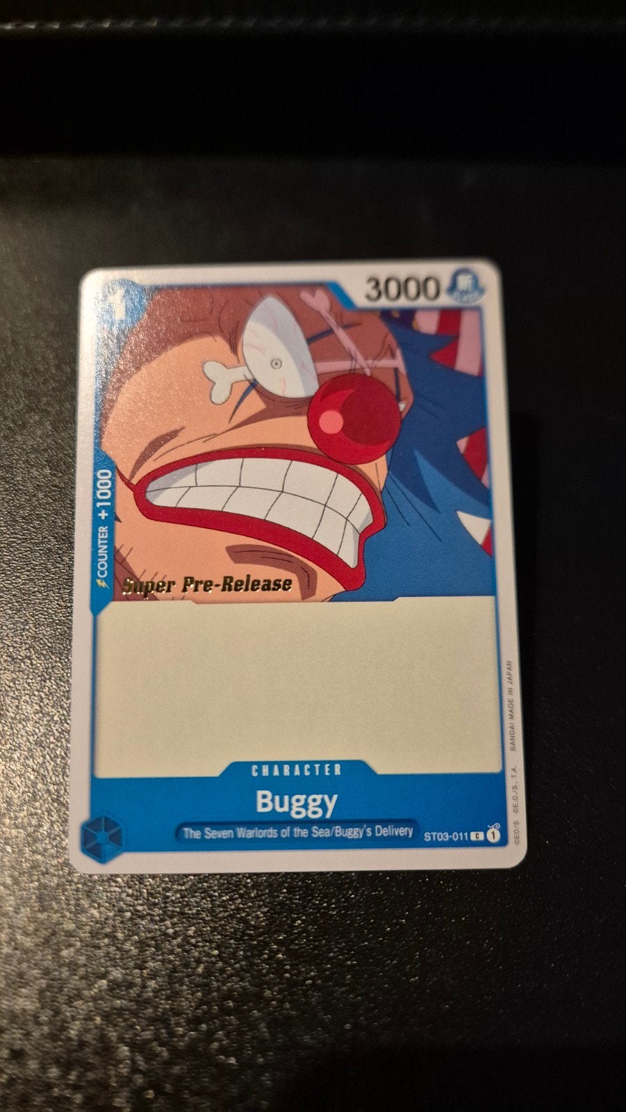 One Piece - Buggy Super Pre-Release ST03-011, Ophalen of Verzenden, Zo goed als nieuw, Losse kaart