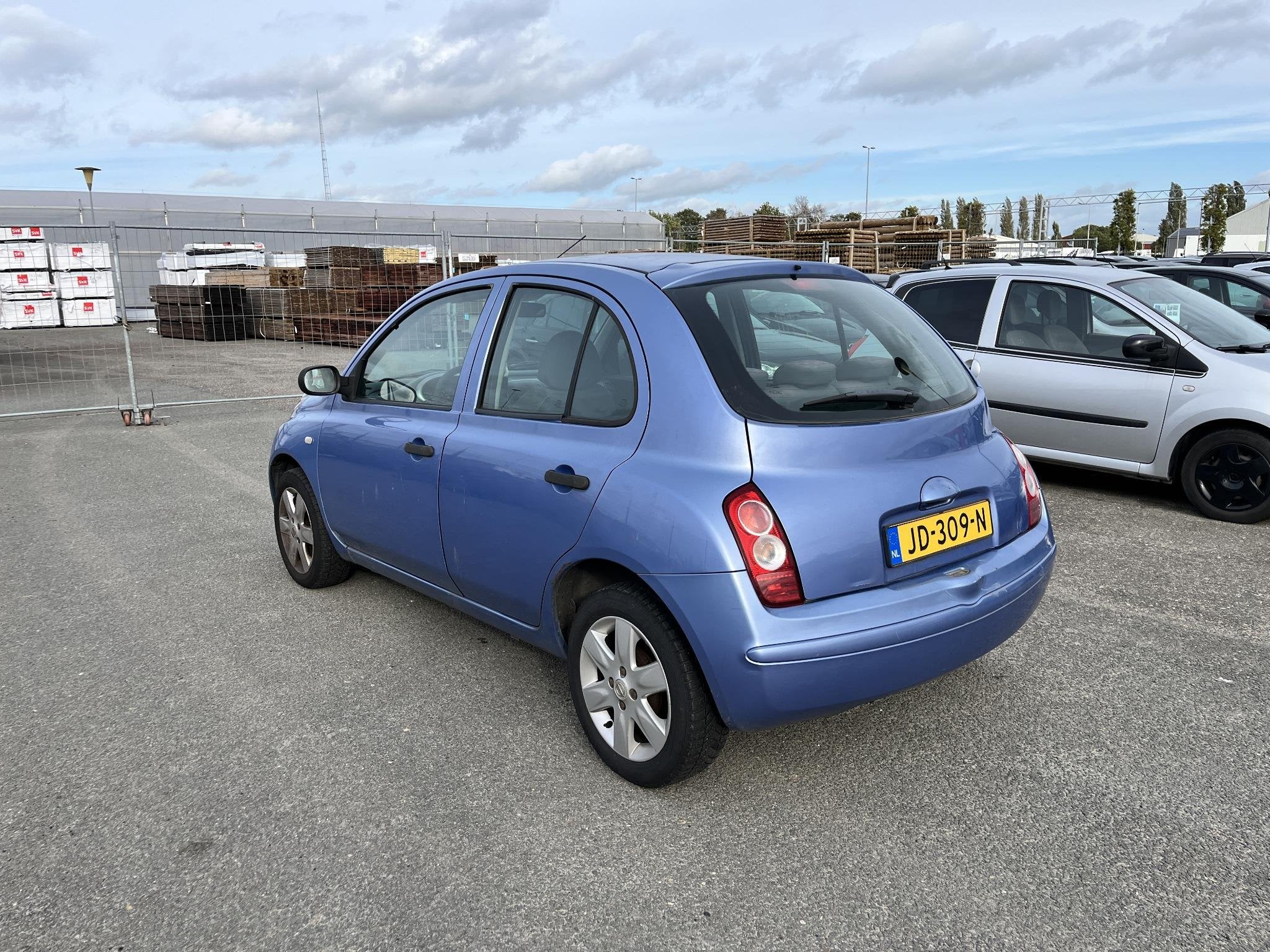 Nissan Micra 1.2 Visia Airco, stuurbekrachtiging, elektrisch, Stof, 4 cilinders, Blauw, Handgeschakeld