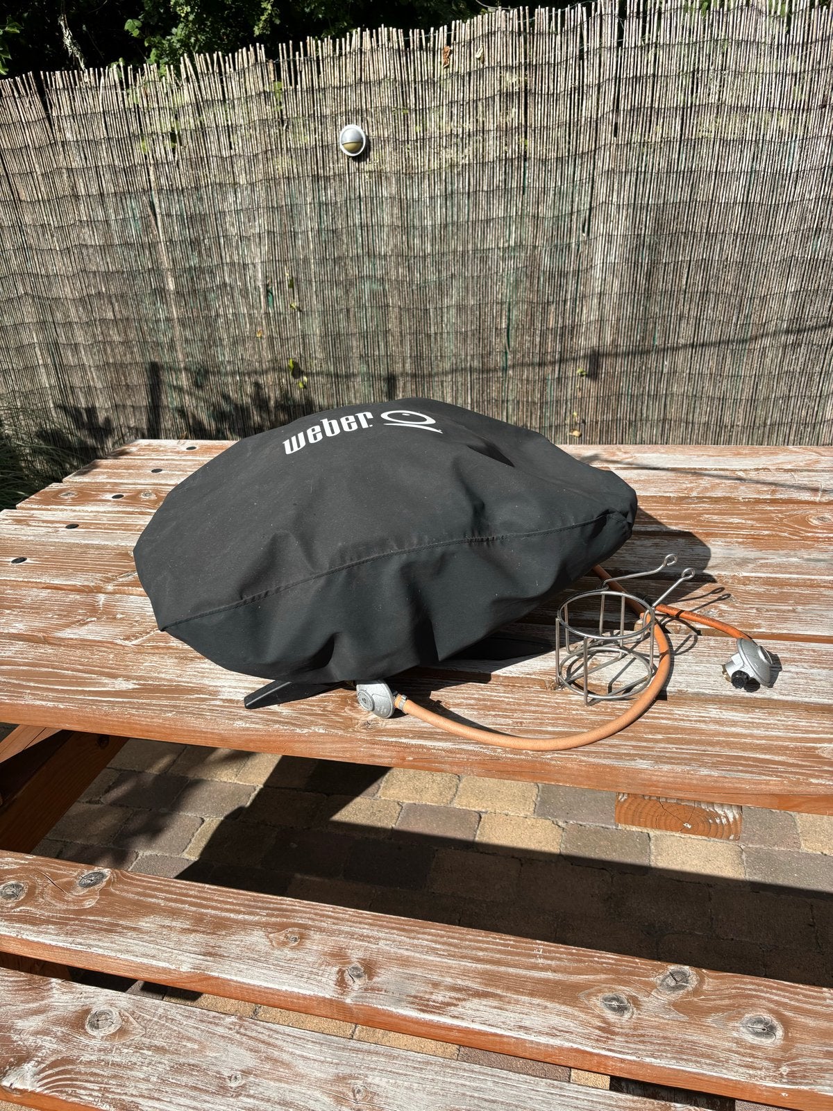 Weber Q100 gasbarbecue met hoes, Ophalen, Gebruikt