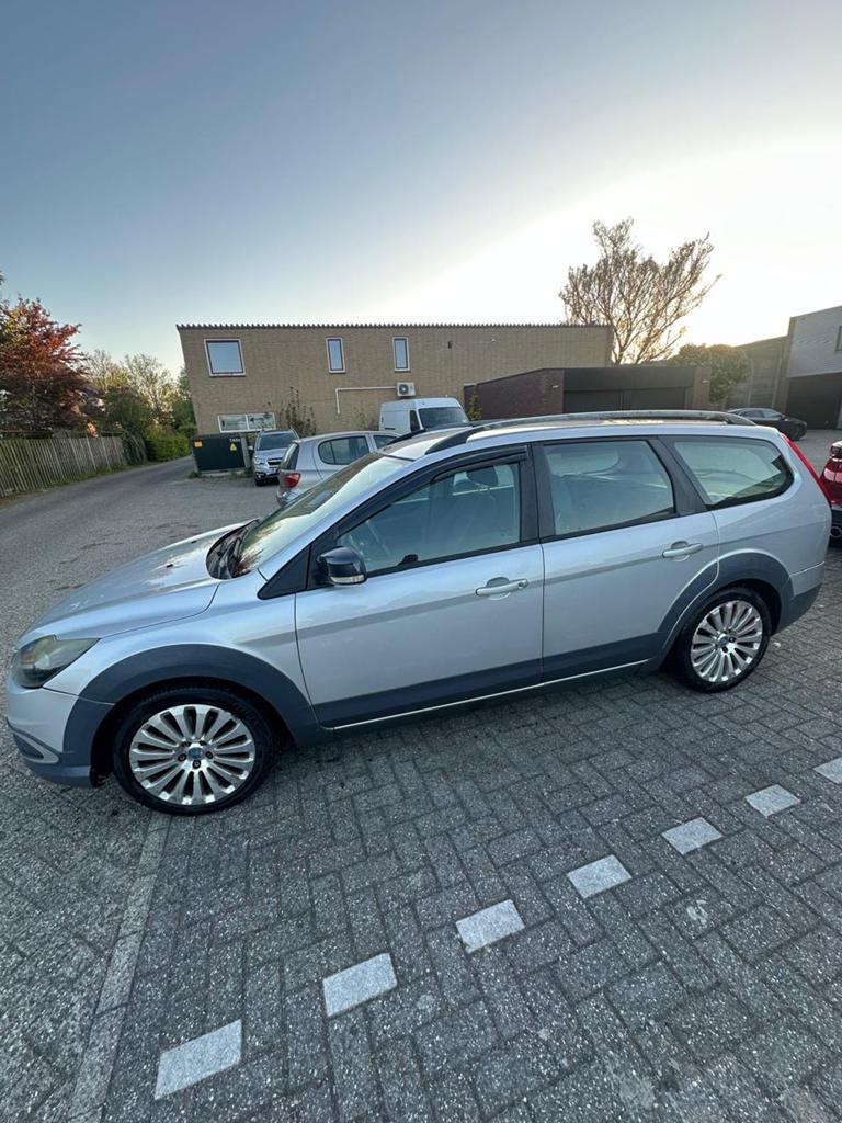 Ford Focus 1.6 16V 100PK 2009 Grijs, 1596 cc, 15 km/l, 4 cilinders, 635 kg