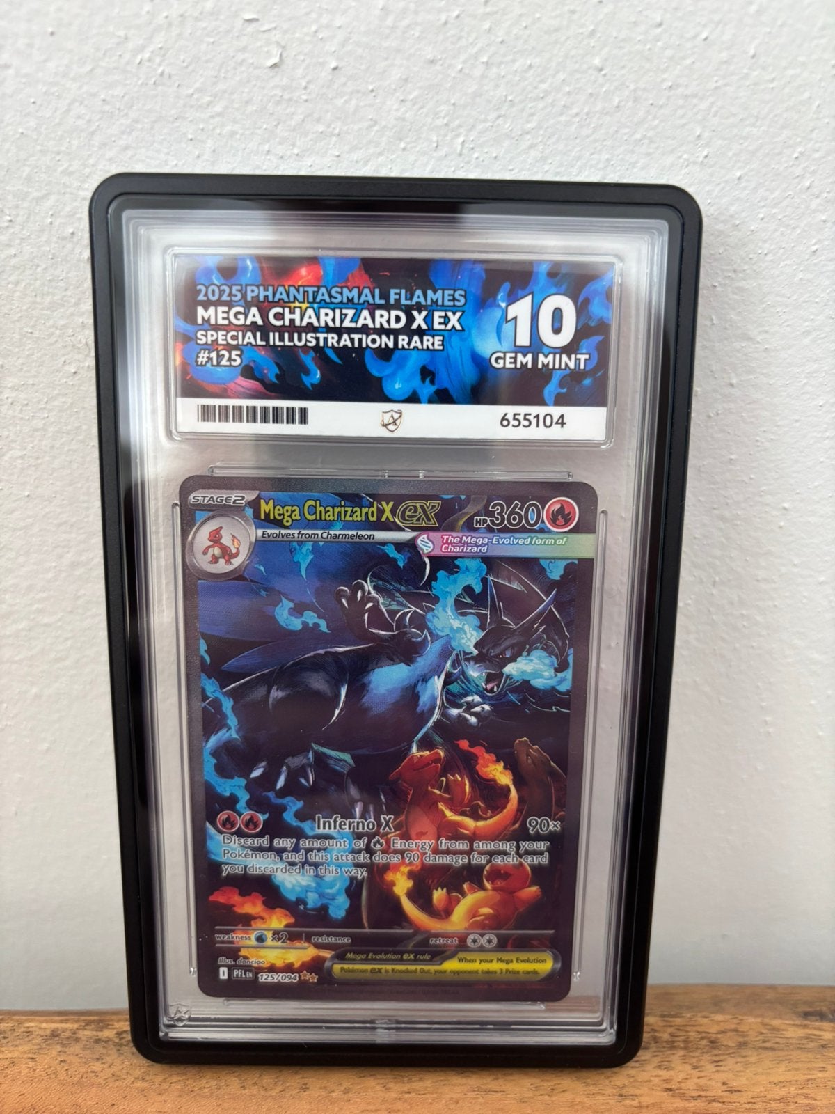 Mega Charizard X EX 125/094 Phantasmal Flames, Ophalen of Verzenden, Zo goed als nieuw, Losse kaart