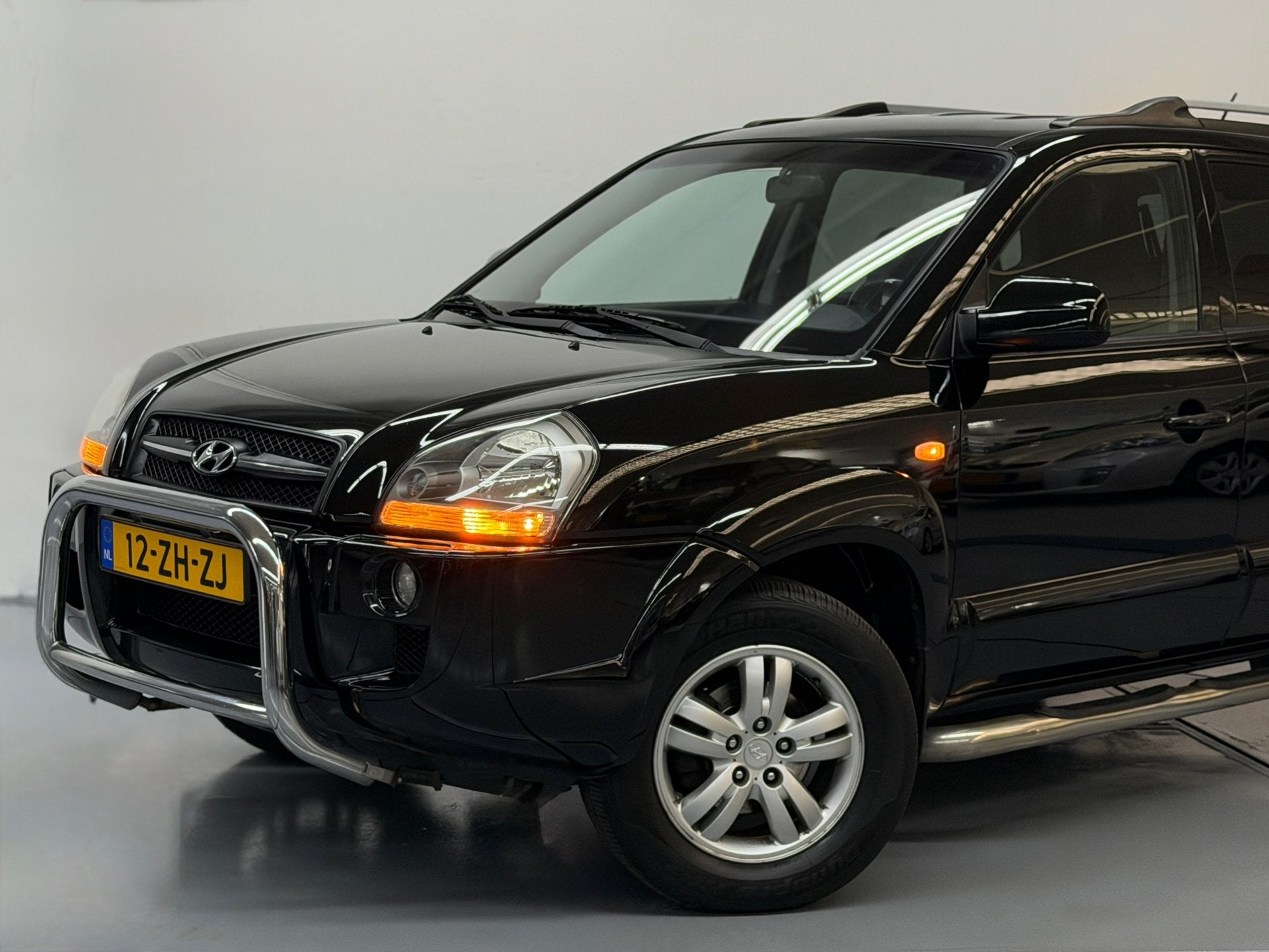 Hyundai Tucson 2.0i Style 1e Eigenaar Airco Cruise APK Nette, Auto's, Dealer onderhouden, Stof, Gebruikt, Zwart