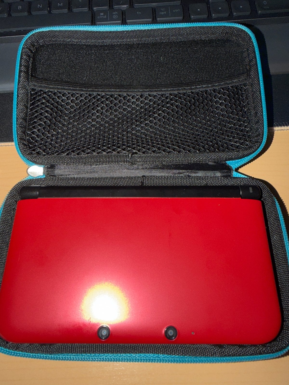 Rode Nintendo 3DS XL met beschermhoes en spellen, Spelcomputers en Games, 3DS XL, Ophalen of Verzenden, Zo goed als nieuw, Rood