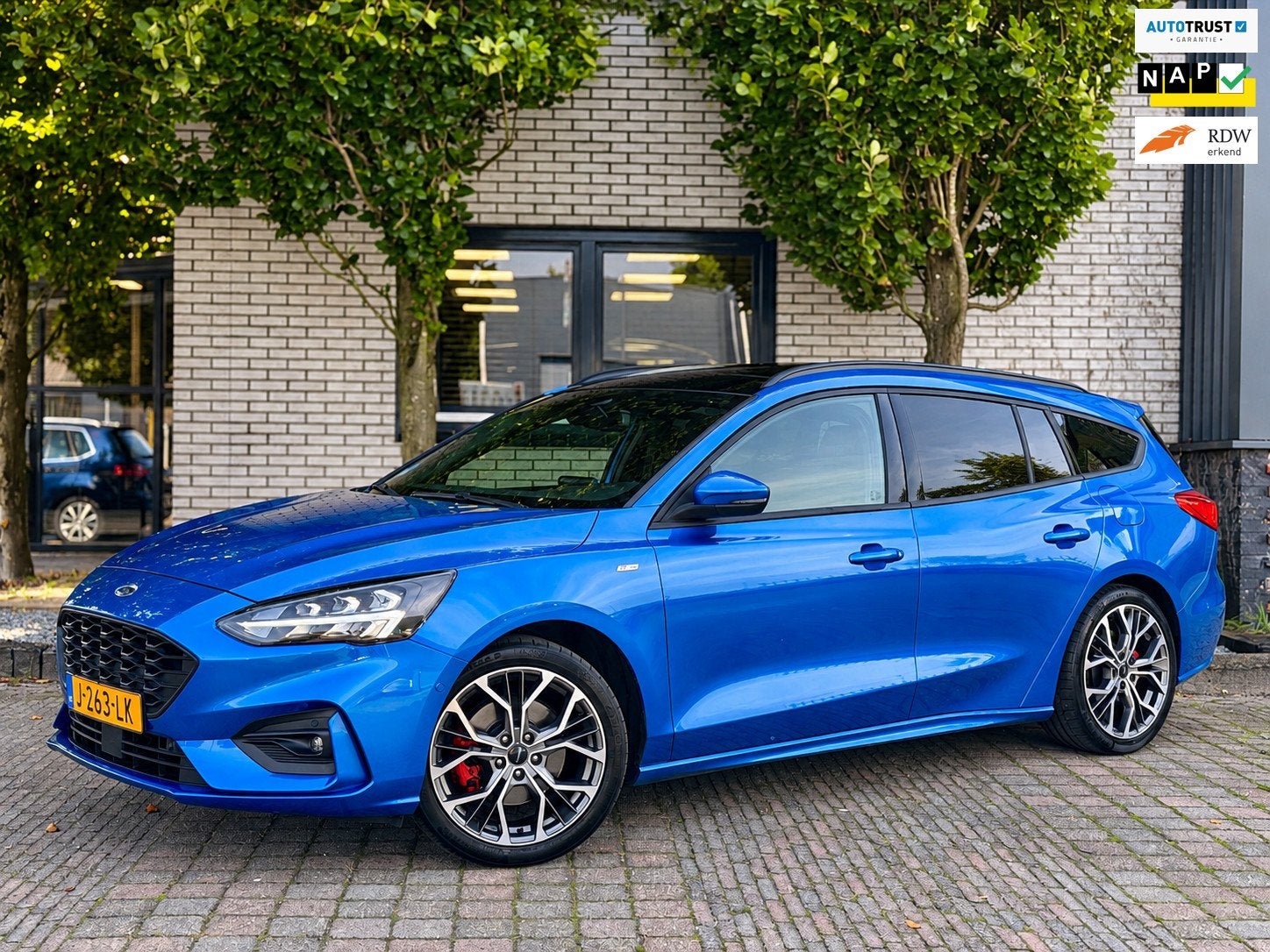 Ford Focus Wagon 1.0 EcoBoost Hybrid ST Line X Business Deal, Auto's, Dealer onderhouden, Stof, Gebruikt, Blauw