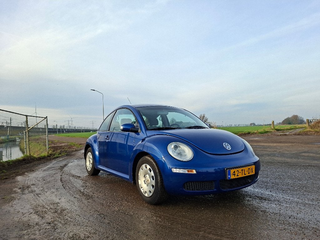 Volkswagen Beetle (Kever) 1.4 55KW 2006 Blauw Airco, Voorwielaandrijving, Stof, 74 pk, Beetle (Kever)
